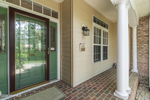 308 Crooked Gulley Cir, Sunset Beach, NC 28468 - property entrance with a porch