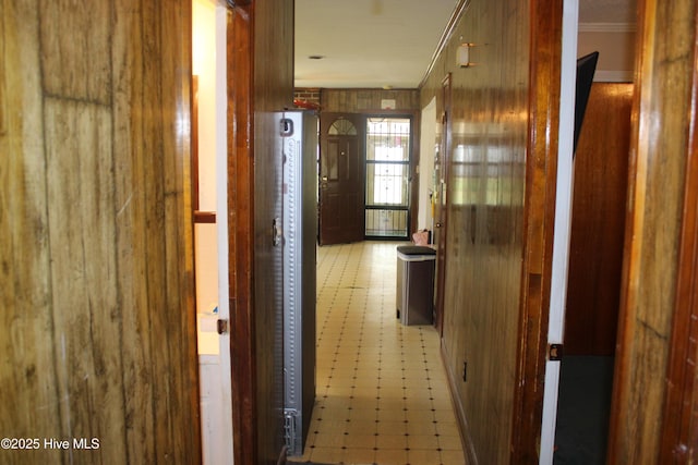 2489 Rodgers School Rd, Williamston, NC 27892 - hall with light flooring, ornamental molding, and wood walls