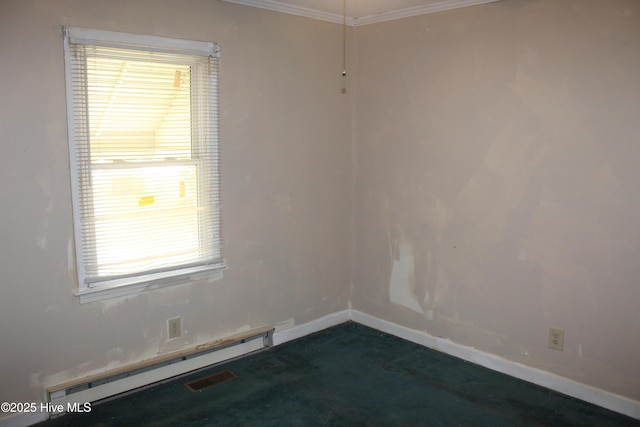 2489 Rodgers School Rd, Williamston, NC 27892 - spare room with baseboard heating, crown molding, and baseboards