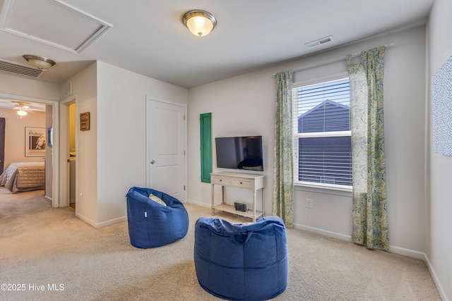 815 Avington Ln NE, Leland, NC 28451 - living area featuring carpet, baseboards, and attic access