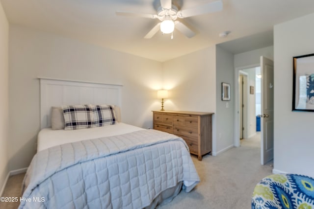 815 Avington Ln NE, Leland, NC 28451 - bedroom featuring light carpet, baseboards, and a ceiling fan