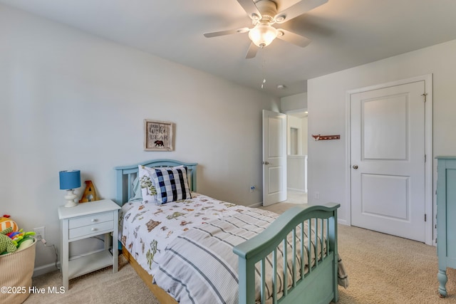 815 Avington Ln NE, Leland, NC 28451 - bedroom with light colored carpet, baseboards, and a ceiling fan