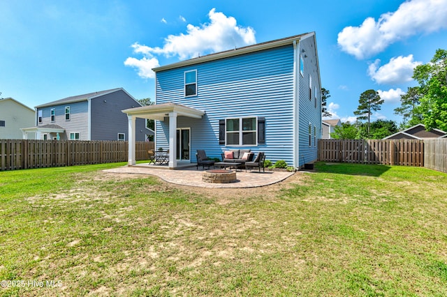 815 Avington Ln NE, Leland, NC 28451 - back of house featuring a patio and an outdoor living space with a fire pit