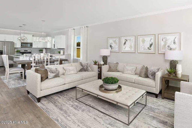 241 Eagle Claw Dr Unit 4014, Carolina Shores, NC 28467 - living area with light wood-style floors, ornamental molding, and a chandelier