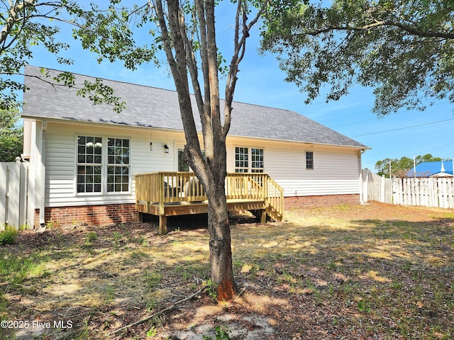 1 Willetts Dr, Southport, NC 28461 - back of house with a wooden deck and a shingled roof