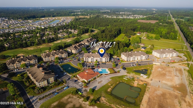 395 S Crow Creek Dr Unit 1601, Calabash, NC 28467 - aerial view of property's location with a golf club, a heavily wooded area, and a large body of water