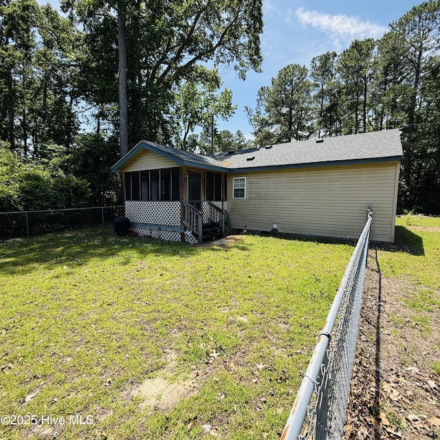 117 Navaho Trl, Edenton, NC 27932 - rear view of house with a sunroom