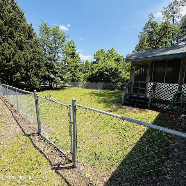 117 Navaho Trl, Edenton, NC 27932 - view of yard featuring entry steps, a gate, and a sunroom