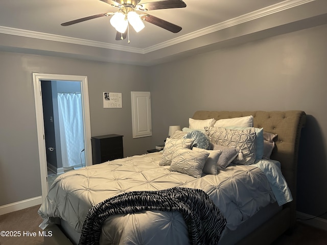 carpeted bedroom featuring ornamental molding, baseboards, and ceiling fan