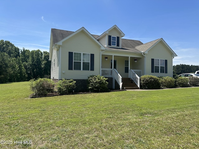 view of front of home featuring covered porch and a front yard
