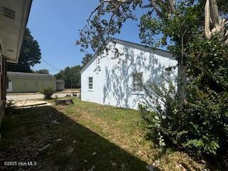 5106 Hodge St, Fayetteville, NC 28303 - view of side of home featuring stucco siding
