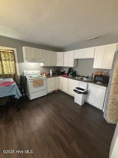 5106 Hodge St, Fayetteville, NC 28303 - kitchen with white electric stove, dark wood-style flooring, and white cabinetry