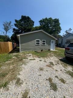 5106 Hodge St, Fayetteville, NC 28303 - view of side of property featuring fence