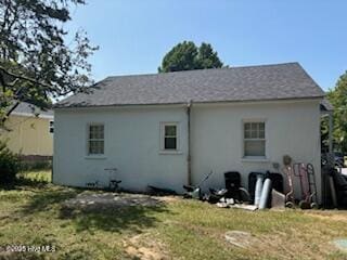 5106 Hodge St, Fayetteville, NC 28303 - rear view of property featuring a lawn