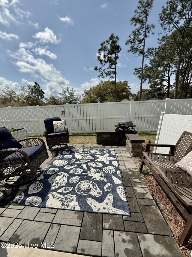 264 Great Egret Way, Beaufort, NC 28516 - fenced backyard with a patio