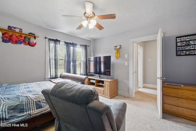 1047 US Highway 158 W, Gates, NC 27937 - bedroom featuring light colored carpet, ceiling fan, and baseboards