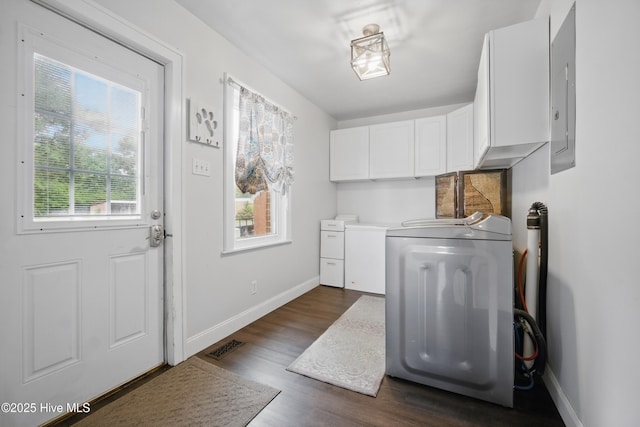 1047 US Highway 158 W, Gates, NC 27937 - laundry room featuring washing machine and dryer, dark wood-style flooring, baseboards, electric panel, and cabinet space