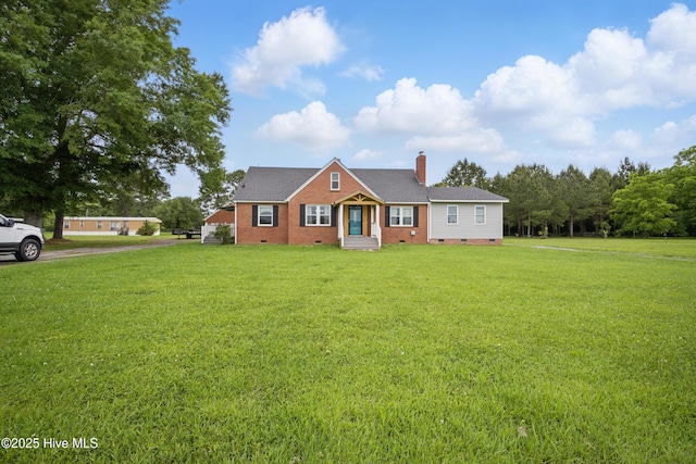 1047 US Highway 158 W, Gates, NC 27937 - view of front facade featuring crawl space, a chimney, a front yard, and brick siding