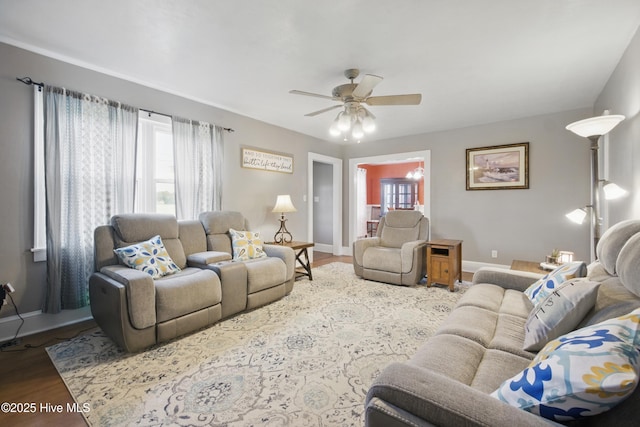 1047 US Highway 158 W, Gates, NC 27937 - living area with wood finished floors, ceiling fan, and baseboards
