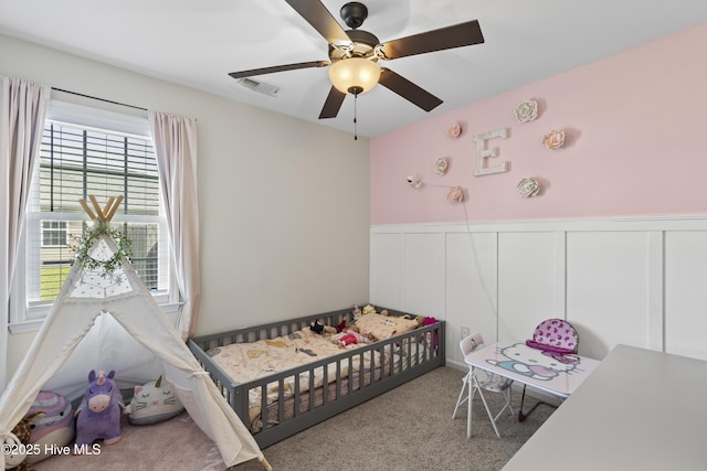 112 Silver Queen Ln, Richlands, NC 28574 - bedroom featuring wainscoting, carpet floors, a decorative wall, and ceiling fan