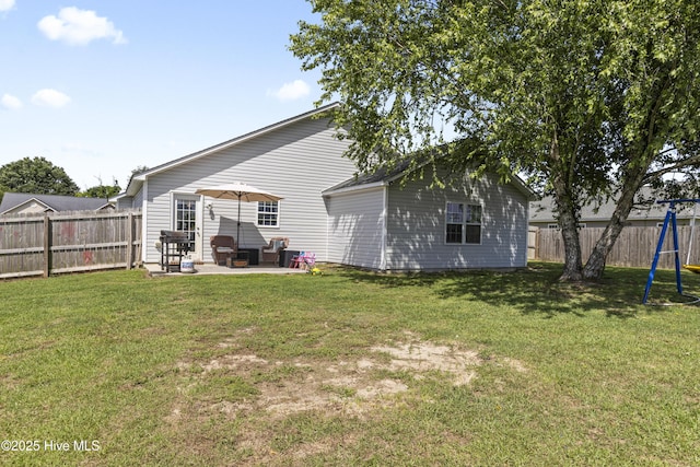 112 Silver Queen Ln, Richlands, NC 28574 - rear view of house featuring a patio