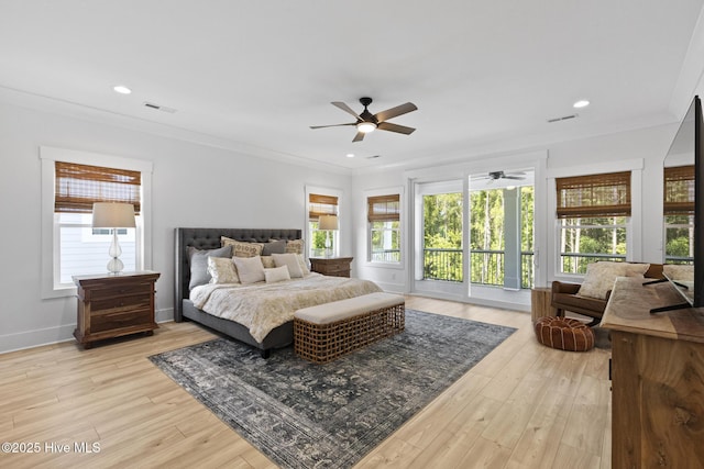 510 White Picket Way, Holly Ridge, NC 28445 - bedroom with access to outside, multiple windows, ornamental molding, light wood-type flooring, and a ceiling fan