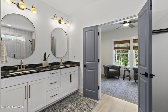 510 White Picket Way, Holly Ridge, NC 28445 - full bathroom featuring double vanity, a ceiling fan, and wood finished floors