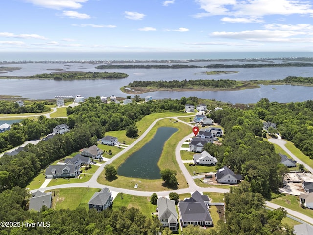 510 White Picket Way, Holly Ridge, NC 28445 - aerial perspective of suburban area with a large body of water