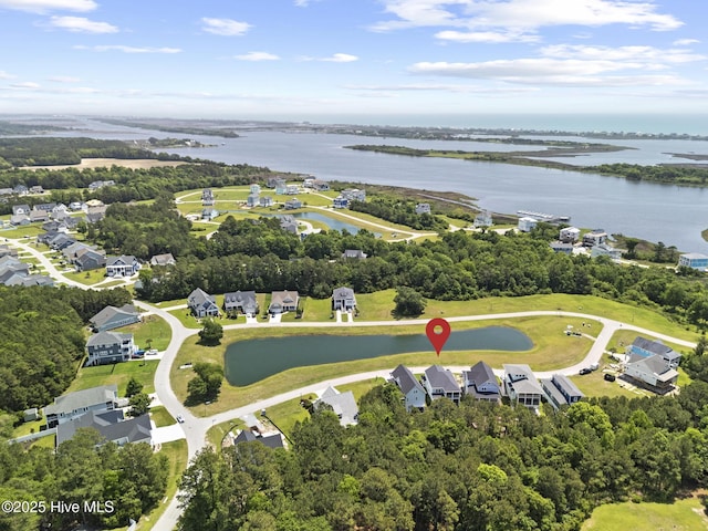 510 White Picket Way, Holly Ridge, NC 28445 - aerial overview of property's location featuring a large body of water, a tree filled landscape, and nearby suburban area