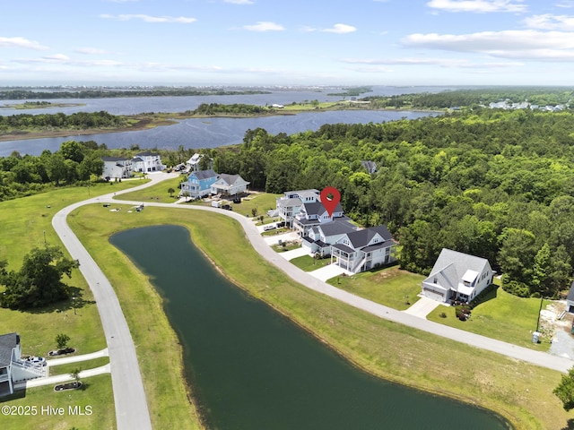 510 White Picket Way, Holly Ridge, NC 28445 - bird's eye view of a nearby body of water and a heavily wooded area