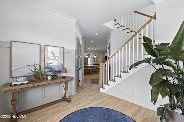 510 White Picket Way, Holly Ridge, NC 28445 - entrance foyer featuring light wood-type flooring, stairway, and recessed lighting