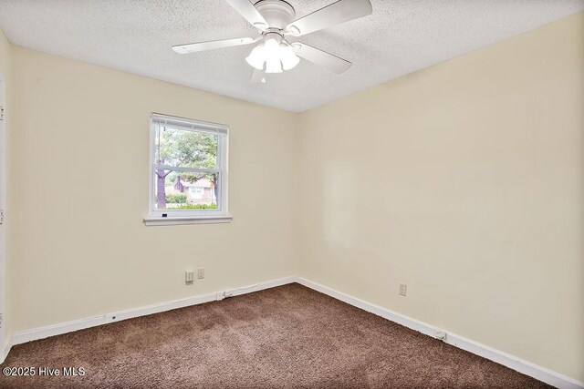 326 Spartan Rd, Wilmington, NC 28405 - spare room featuring dark carpet, baseboards, ceiling fan, and a textured ceiling