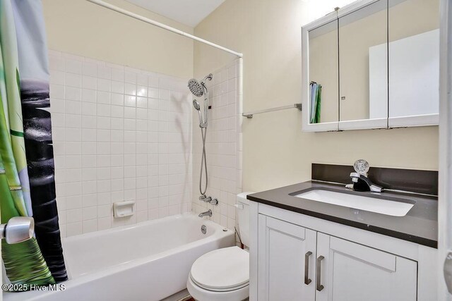 326 Spartan Rd, Wilmington, NC 28405 - full bathroom with shower / bathtub combination with curtain, toilet, and vanity