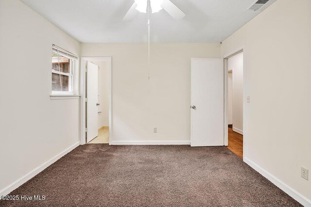 326 Spartan Rd, Wilmington, NC 28405 - carpeted spare room with ceiling fan and baseboards