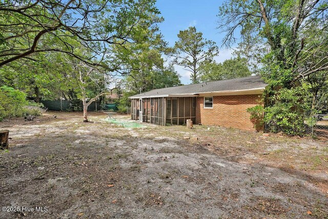 326 Spartan Rd, Wilmington, NC 28405 - view of yard with a sunroom