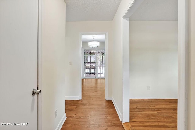 326 Spartan Rd, Wilmington, NC 28405 - corridor featuring wood finished floors and baseboards