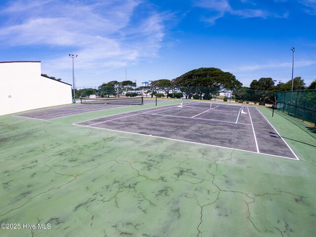 1505 Salter Path Rd Unit 319, Indian Beach, NC 28512 - view of tennis court with fence and community basketball court