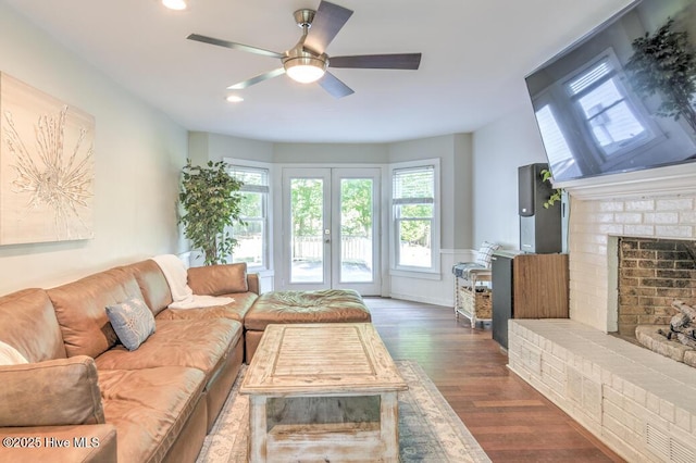 2428 Tram Rd, New Bern, NC 28562 - living area with dark wood finished floors, a ceiling fan, a fireplace, and recessed lighting