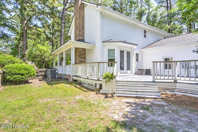 2428 Tram Rd, New Bern, NC 28562 - back of property featuring french doors, a wooden deck, a yard, and cooling unit