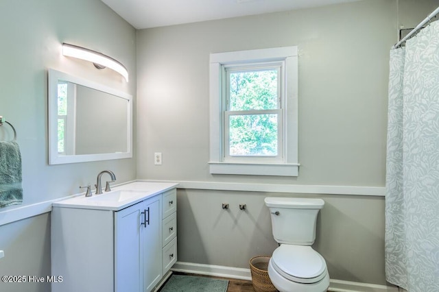 2428 Tram Rd, New Bern, NC 28562 - full bath with vanity, toilet, and baseboards