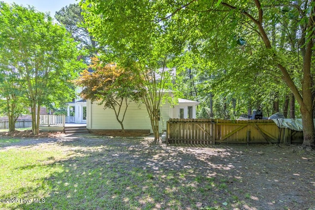 2428 Tram Rd, New Bern, NC 28562 - view of yard with a deck