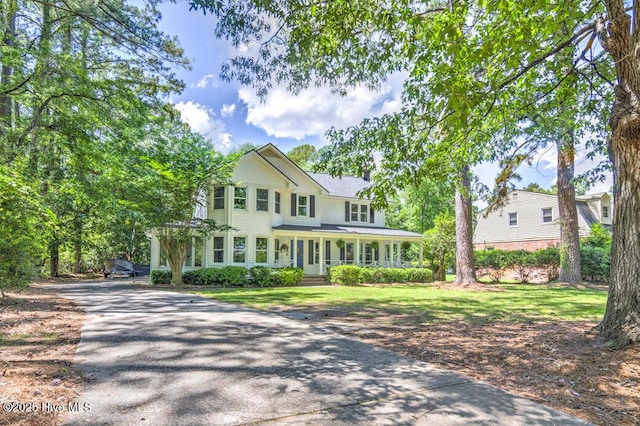 2428 Tram Rd, New Bern, NC 28562 - view of front facade featuring asphalt driveway and covered porch