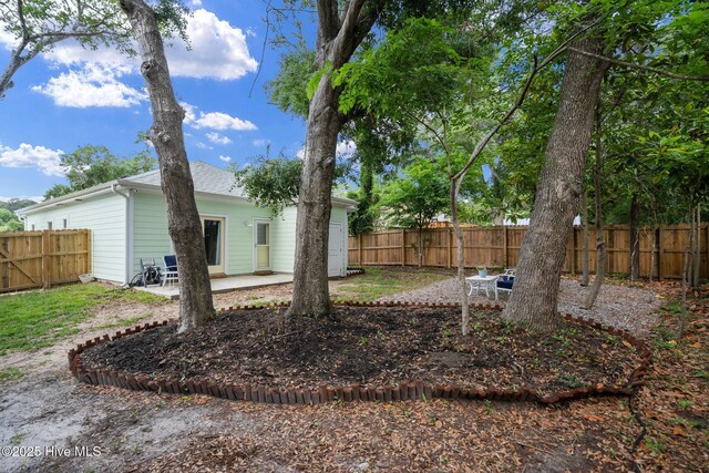492 Jabbertown Rd, Southport, NC 28461 - fenced backyard with a patio