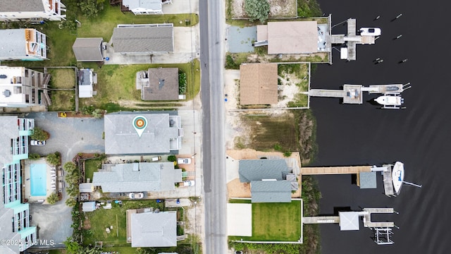 1008 Canal Dr Unit 3A, Carolina Beach, NC 28428 - aerial view of property and surrounding area featuring a large body of water and nearby suburban area