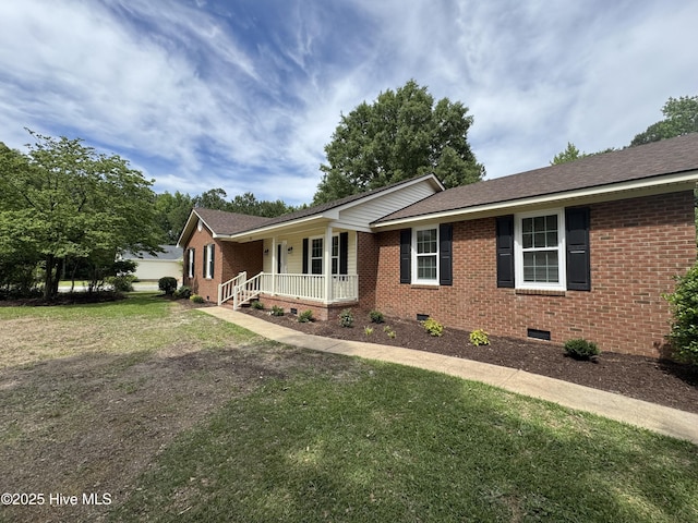 single story home with crawl space, covered porch, brick siding, and a front yard