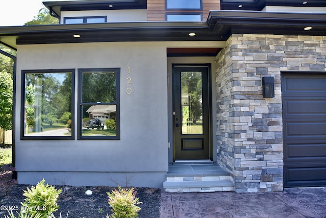 120 Fairview Rd, Leland, NC 28451 - doorway to property featuring a garage and stone siding
