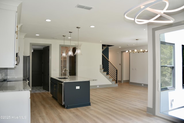 120 Fairview Rd, Leland, NC 28451 - kitchen with a chandelier, a sink, light wood-style flooring, and recessed lighting