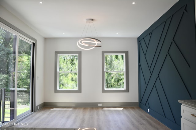 120 Fairview Rd, Leland, NC 28451 - unfurnished dining area with light wood-type flooring, a chandelier, baseboards, and recessed lighting