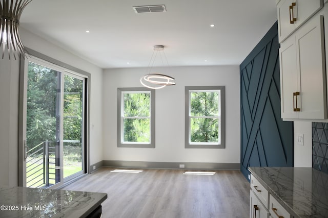 120 Fairview Rd, Leland, NC 28451 - unfurnished dining area featuring healthy amount of natural light, light wood-type flooring, baseboards, and recessed lighting
