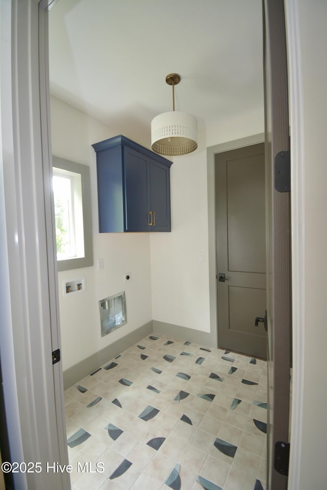 120 Fairview Rd, Leland, NC 28451 - laundry area with cabinet space, hookup for a washing machine, hookup for an electric dryer, and light tile patterned floors